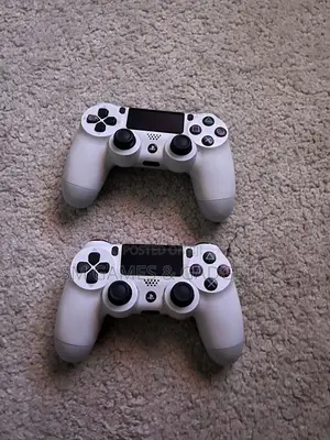 Sony PlayStation 4 Slim, 500gb Storage, 10 Games and 2 Pads