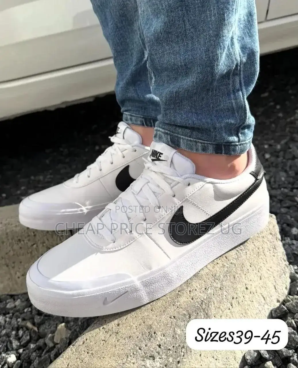 White Stüssy Nike Air 1 Low Sneaker Featuring Black-and-Grey
