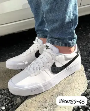 White Stüssy Nike Air 1 Low Sneaker Featuring Black-and-Grey