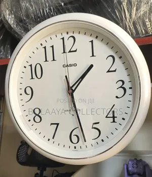 Japanese Casio IQ-1050NJ-7JF Radio-Controlled Analog Wall Clock.
