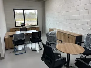 Office Desk and Cabinets With a Round Table