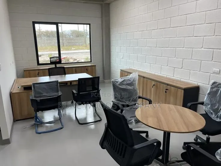 Office Desk and Cabinets With a Round Table