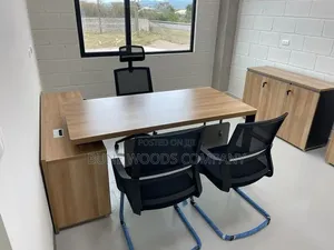 Office Desk and Cabinets With a Round Table