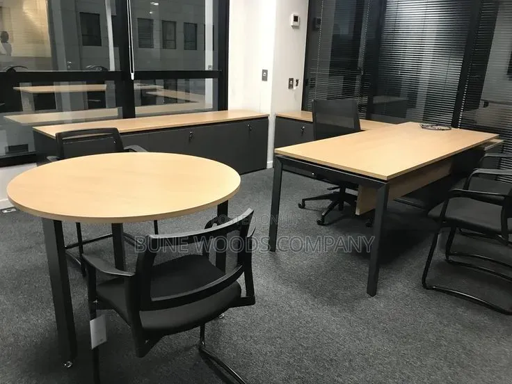 Office Desk and Cabinets With a Round Table