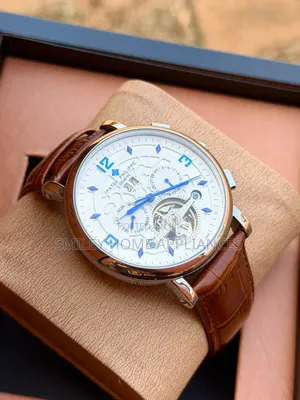 Patek Phillipe Gold Chrome Brown Leather Strapped Mechanical Watch