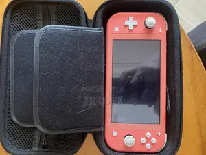 Nintendo Switch Lite (With 3 Game Cards Worth Each)