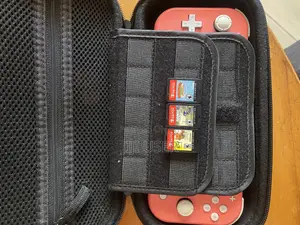 Nintendo Switch Lite (With 3 Game Cards Worth Each)