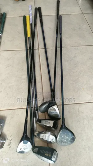 Japanese Pre-Owned Golf Clubs, of Various Woods, Irons, and a Wedge.