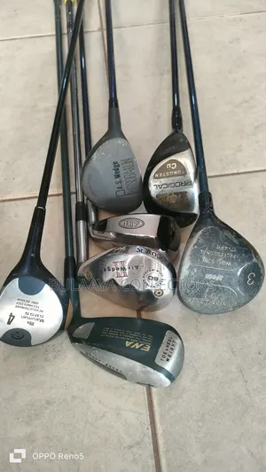 Japanese Pre-Owned Golf Clubs, of Various Woods, Irons, and a Wedge.