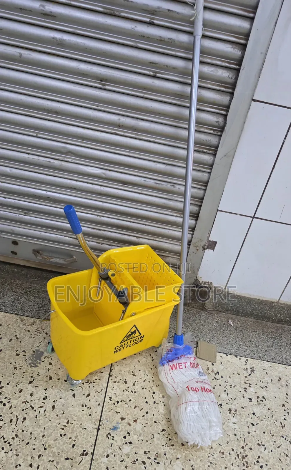 Cleaning Mop Bucket With a Mopper