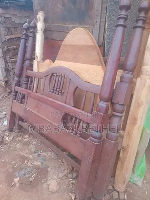 Used 5by6 Wooden Bed in Good Condition Readily Available for Sale