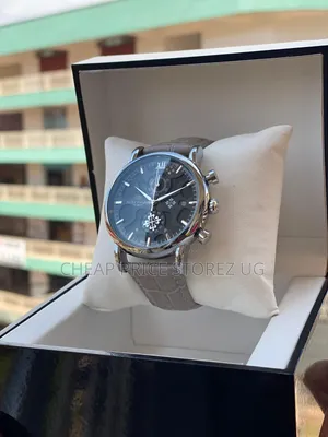 Patek Philippe Geneve Leather Strap With a Silver-Tone Case and a Dark