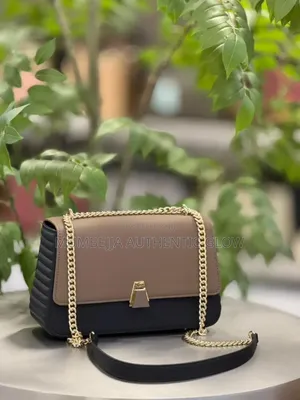 Black and Nude Chris Bella Cross, Shoulder Handbag for Ladies.