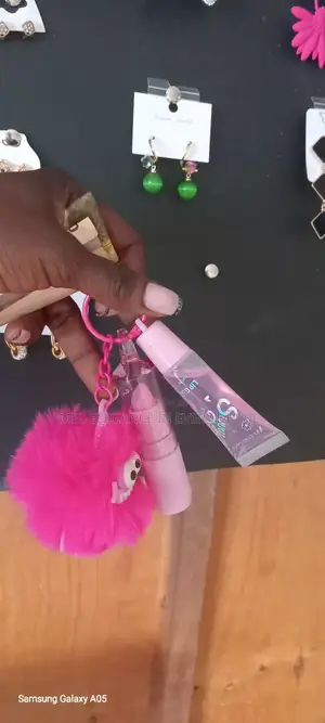 3 in 1 Lip Gloss, Lip Balm and Doll Fluffy Key Holder.