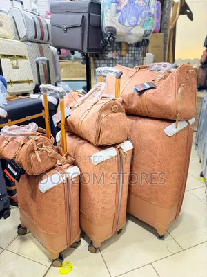 2pc Matching Set of Floral-Embossed Trolley Luggage and Travel Bags.