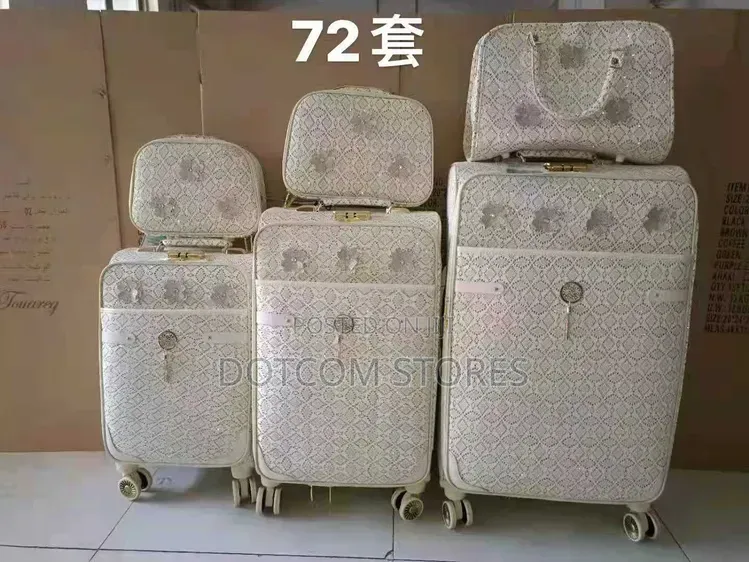 2pc Matching Set of Floral-Embossed Trolley Luggage and Travel Bags.