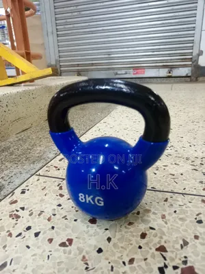 8kg Blue Vinyl-Coated Kettlebell With a Black Textured Handle.