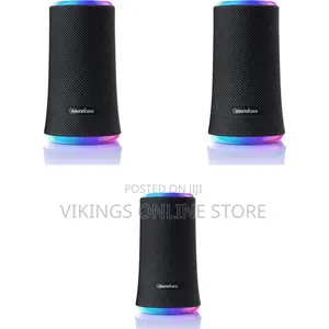 An Anker Soundcore Flare 2 Portable Bluetooth Speaker, a Cylindrical