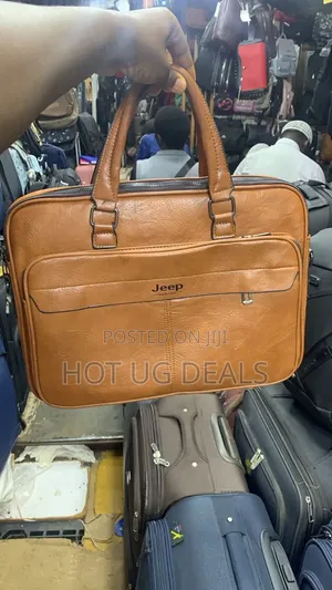Jeep Buluo 15-Inch Waterproof Leather Laptop Bag – Brown