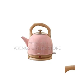Vintage-Style Electric Kettle With Wood-Grain Accents on the Handle