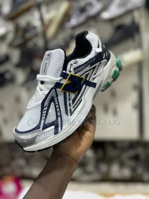 White and Navy Blue New Balance 1906A Sneaker