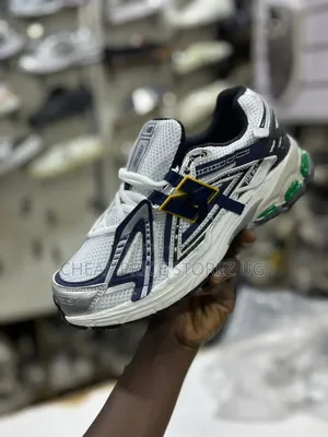 White and Navy Blue New Balance 1906A Sneaker