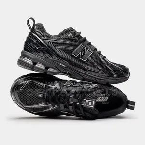 Be a Pair of New Balance 1906R Retro-Tech Running Sneakers