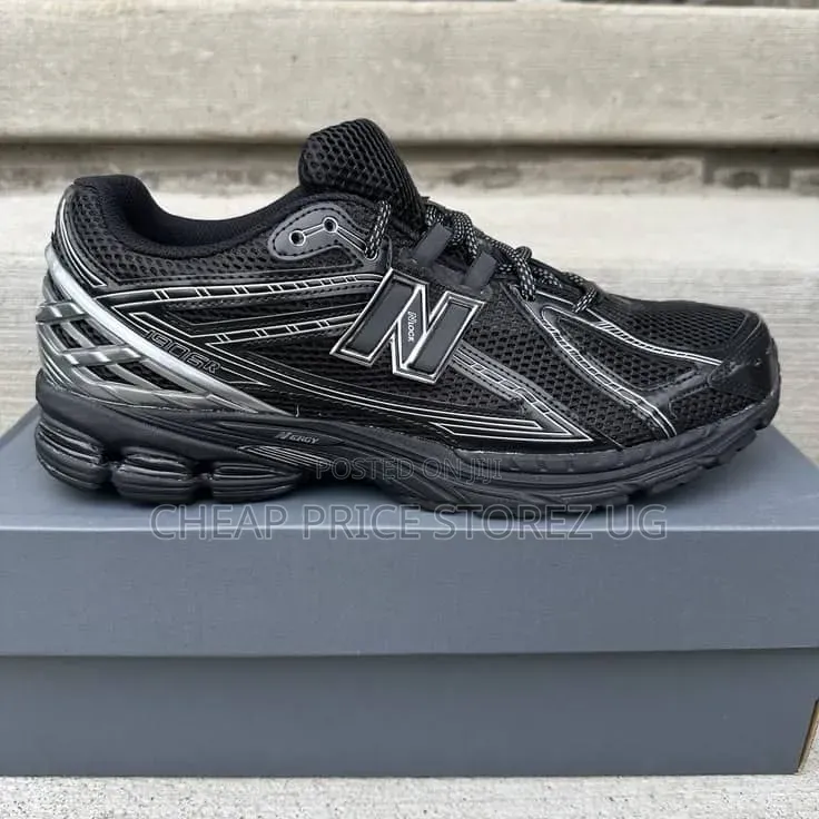 Be a Pair of New Balance 1906R Retro-Tech Running Sneakers