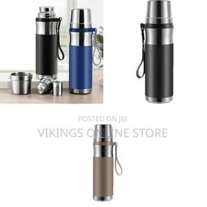Stainless Steel Vacuum Insulated Thermos Flask With a Carrying Strap