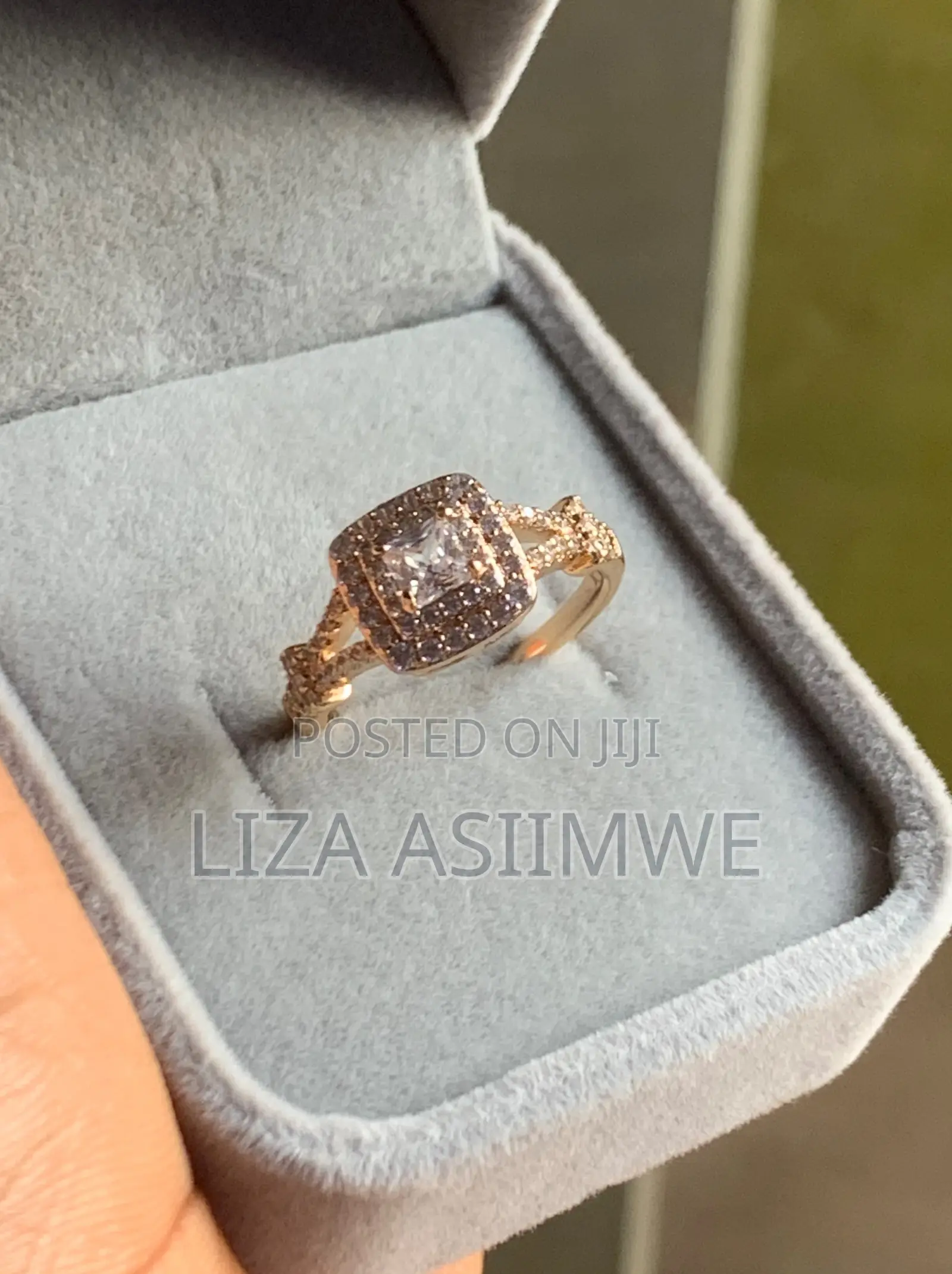 Square Engagement Ring With a Striking Double Halo and a Twisted Band.