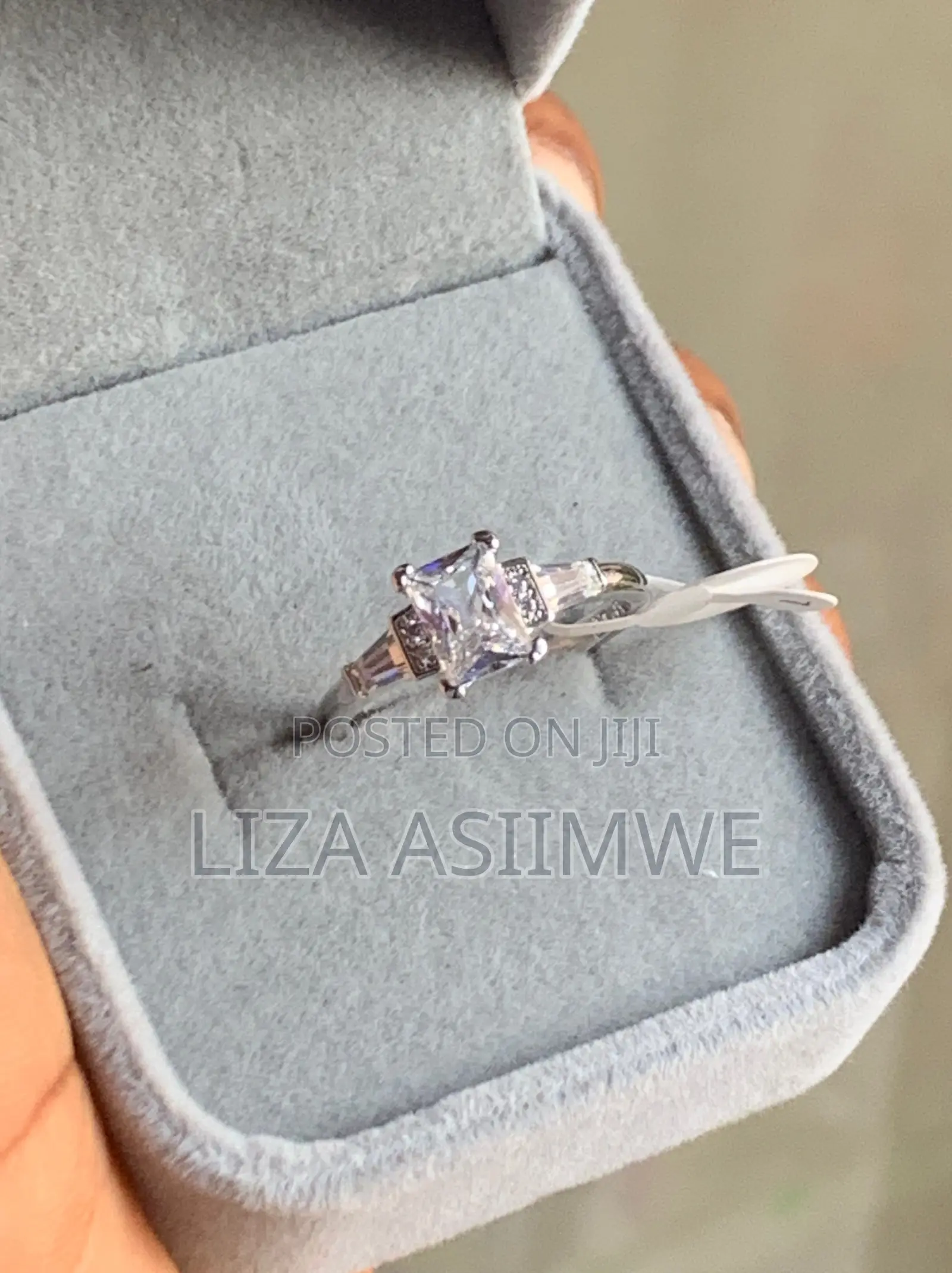 Engagement Ring With a Radiant Cut by Side Baguette Small Pave Stones