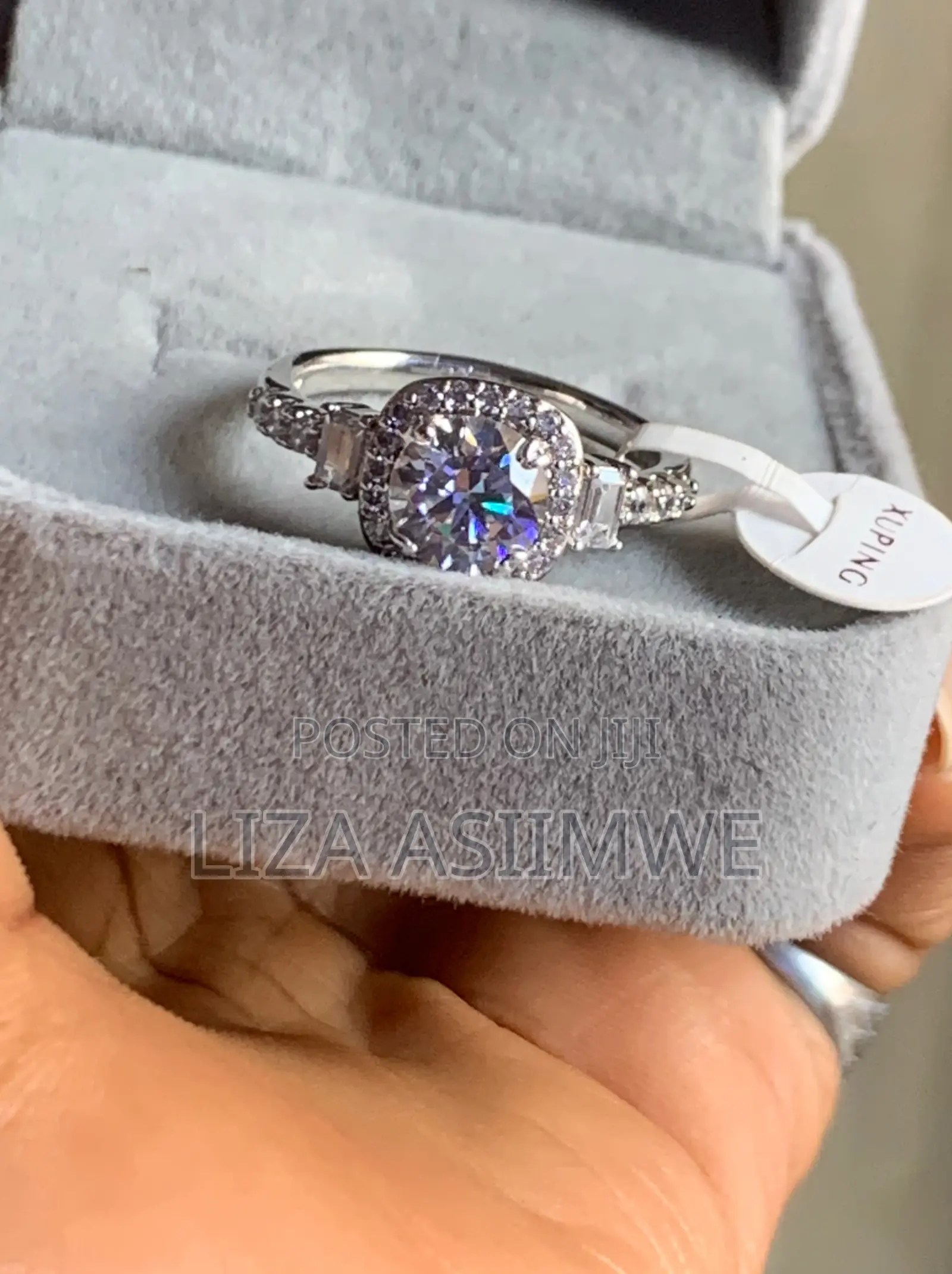 Three-Stone Cushion Halo Engagement Ring