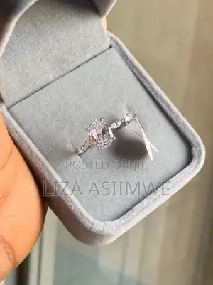 Engagement Ring With Smaller Marquise-Cut Side Stones