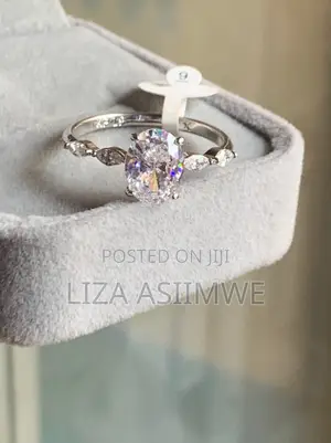 Engagement Ring With Smaller Marquise-Cut Side Stones
