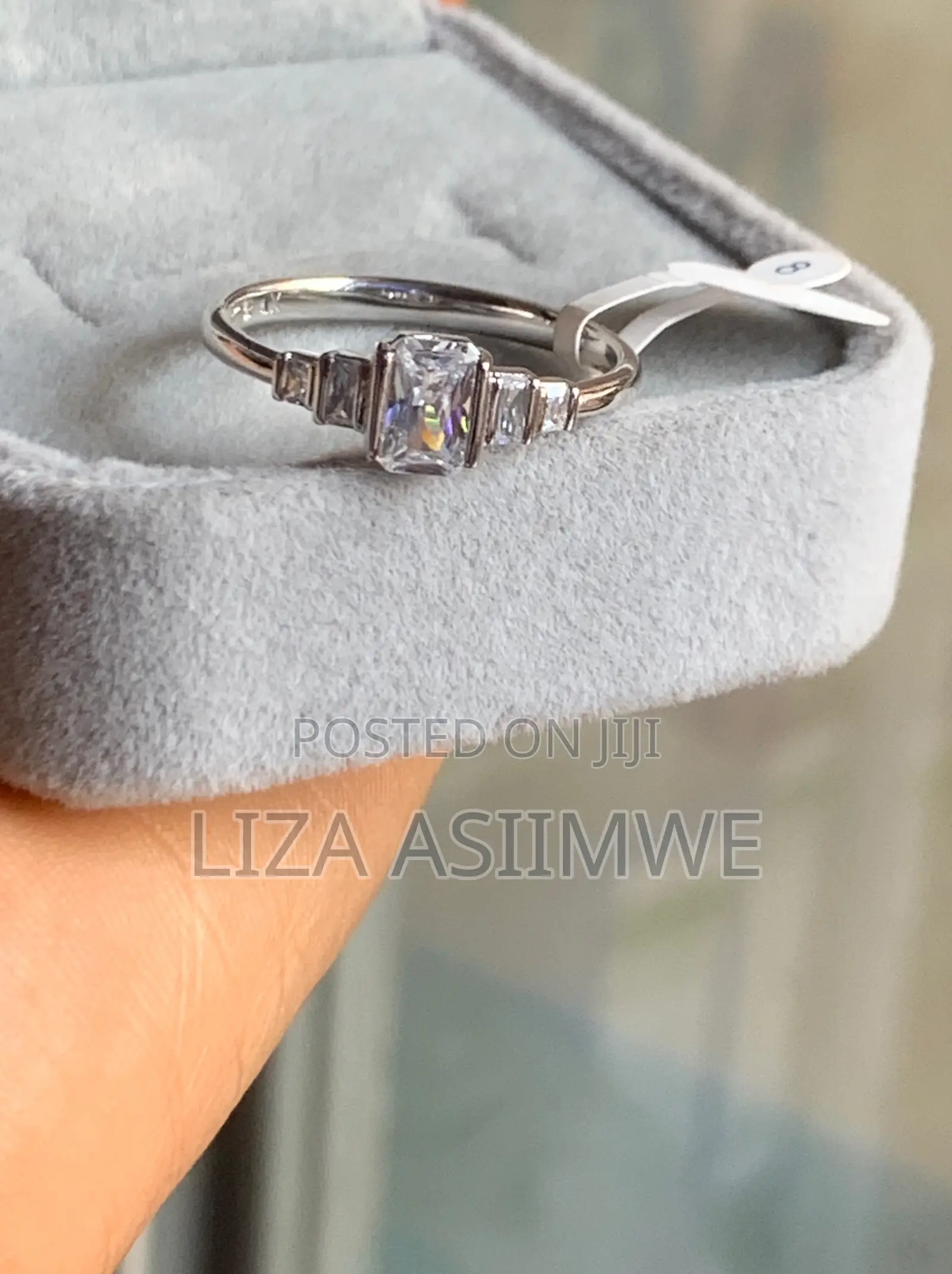Emerald Cut 5-Stone Engagement Ring With Stepped Baguettes