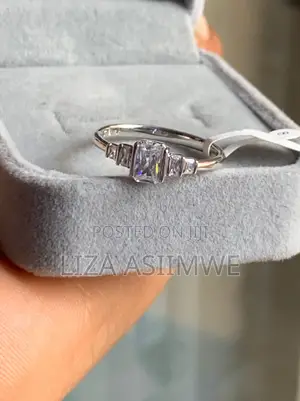 Emerald Cut 5-Stone Engagement Ring With Stepped Baguettes