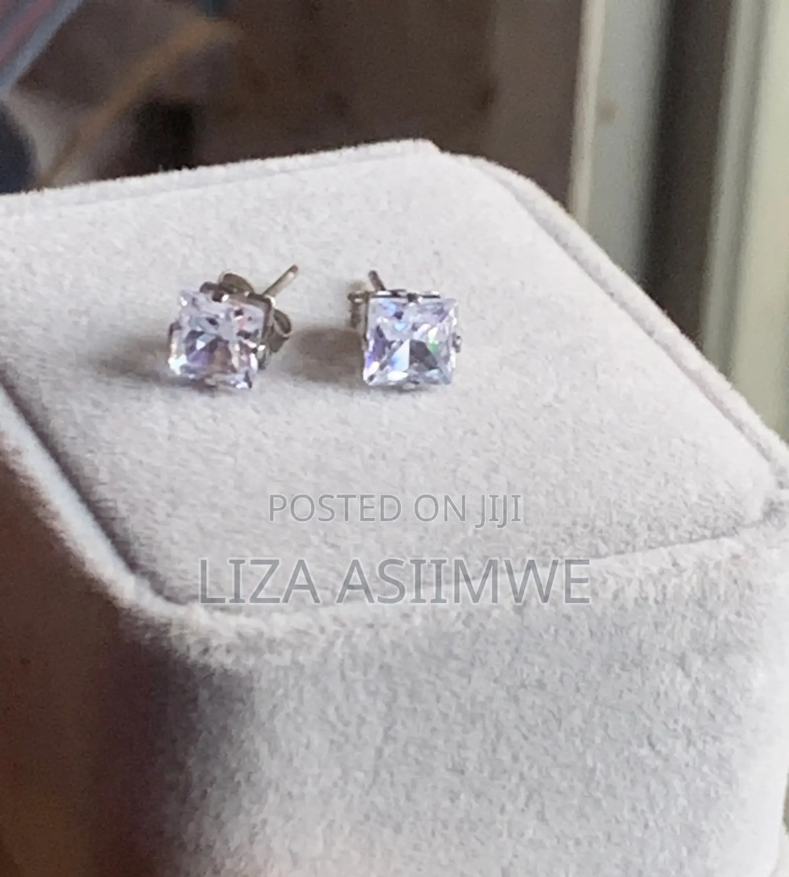 Square Silver-Toned Stud Earrings With a Clear, Faceted Stone Set