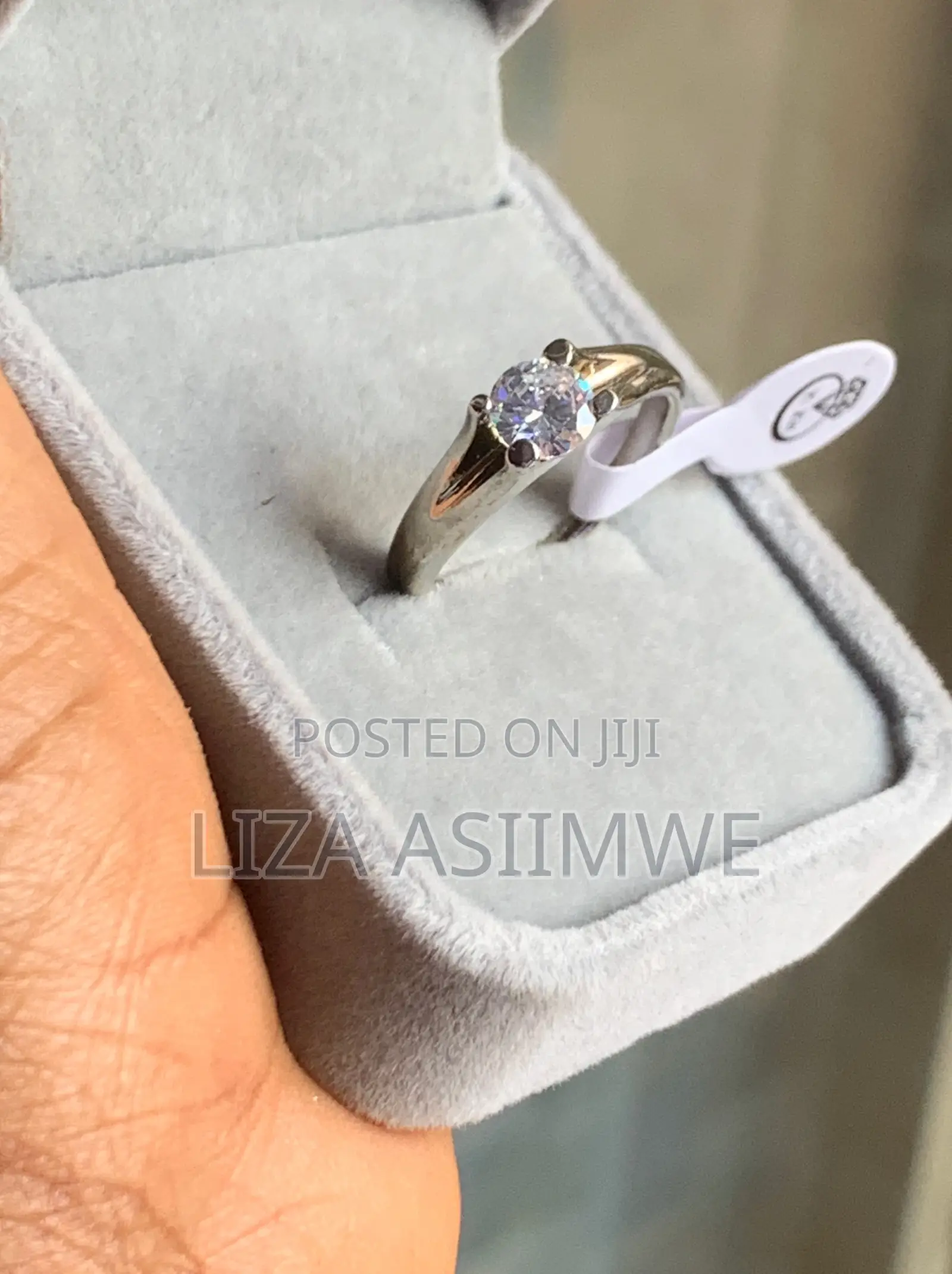 Classic Solitaire Engagement Ring With a Round-Cut Clear Gemstone Set