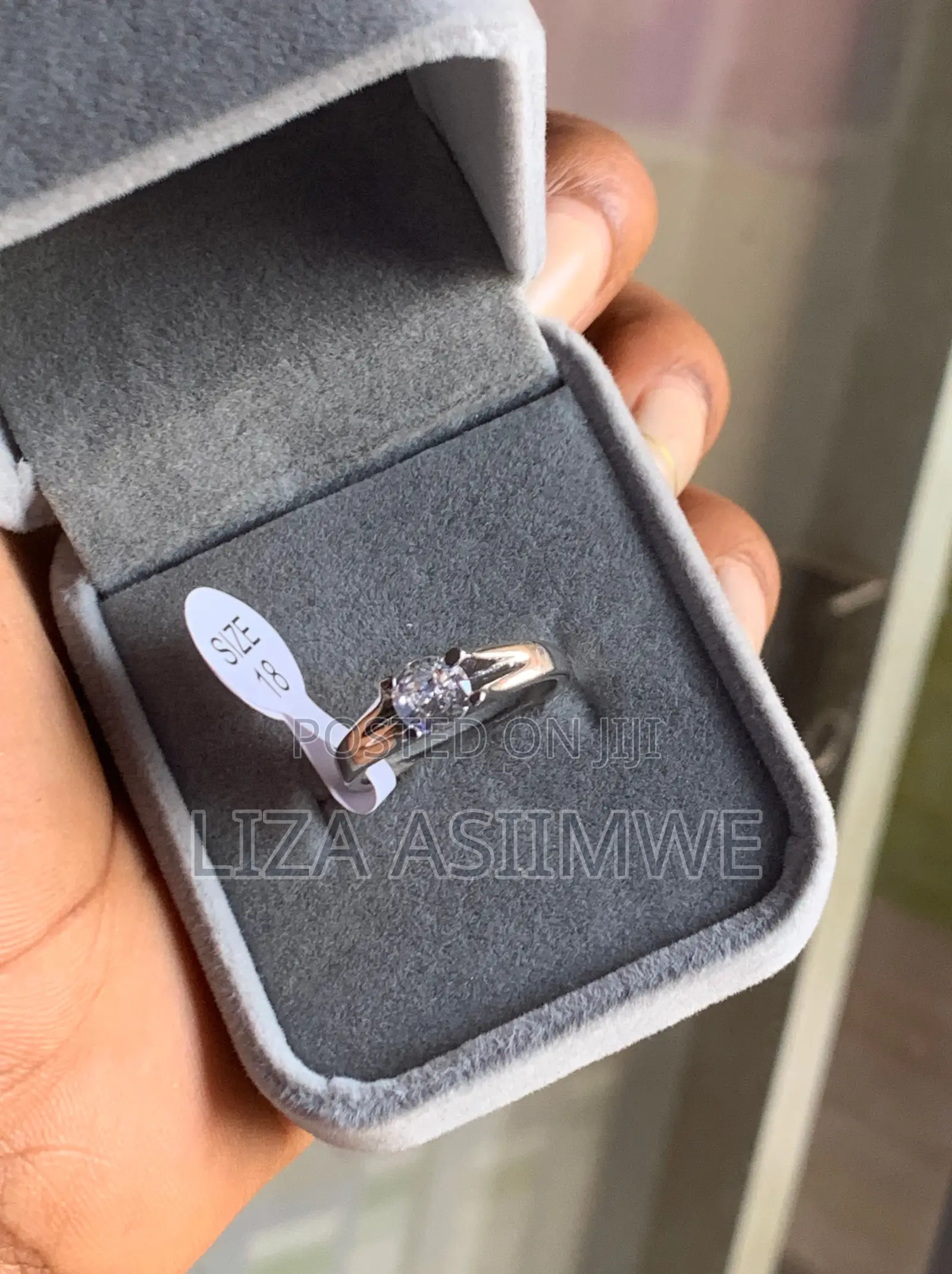 Classic Solitaire Engagement Ring With a Round-Cut Clear Gemstone Set