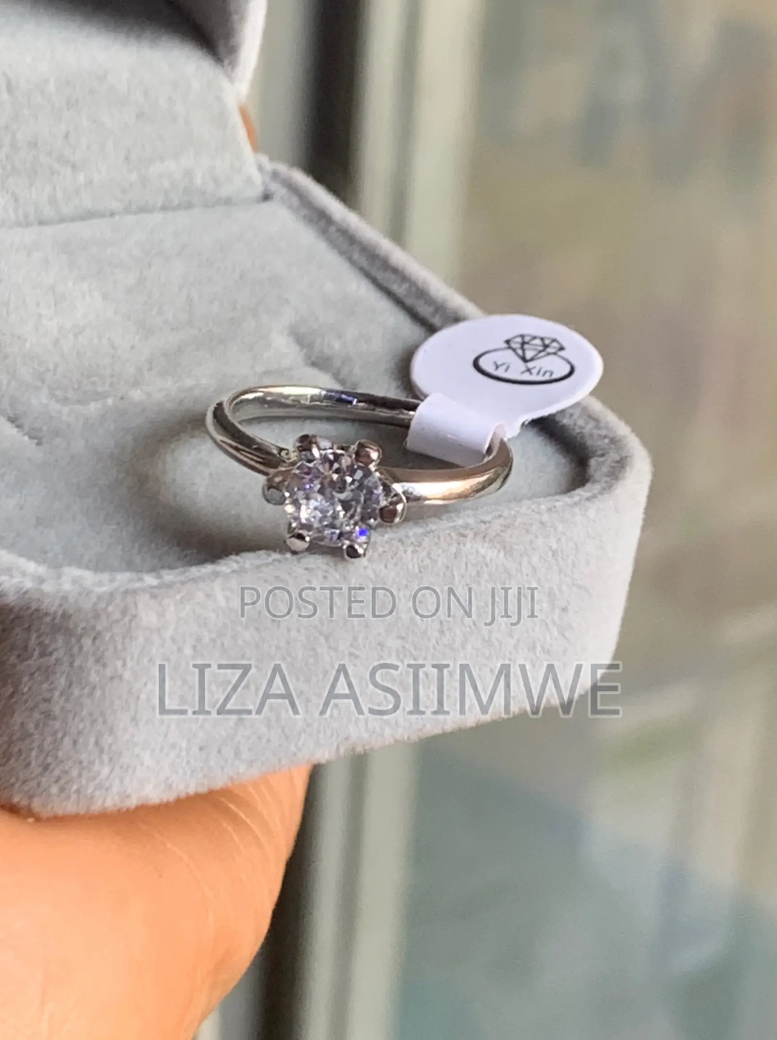 Silver Solitaire Engagement Ring With a Round Center Stone