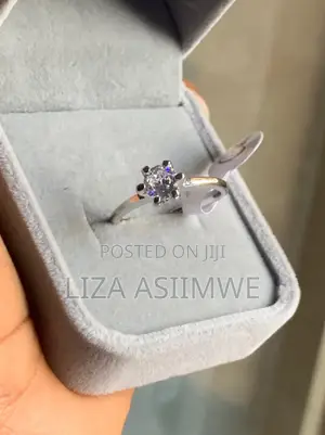 Silver Solitaire Engagement Ring With a Round Center Stone
