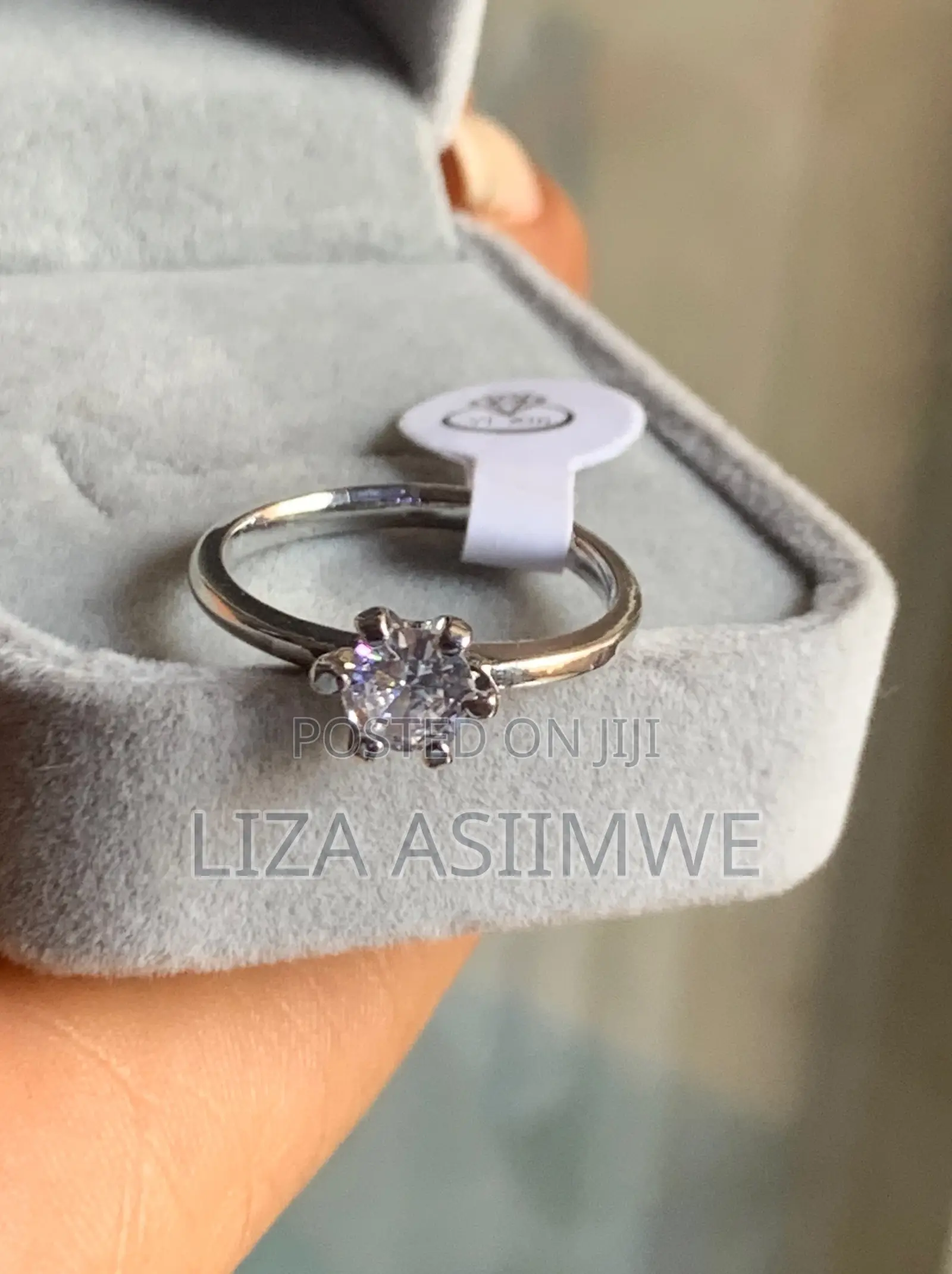 Silver Solitaire Engagement Ring With a Round Center Stone