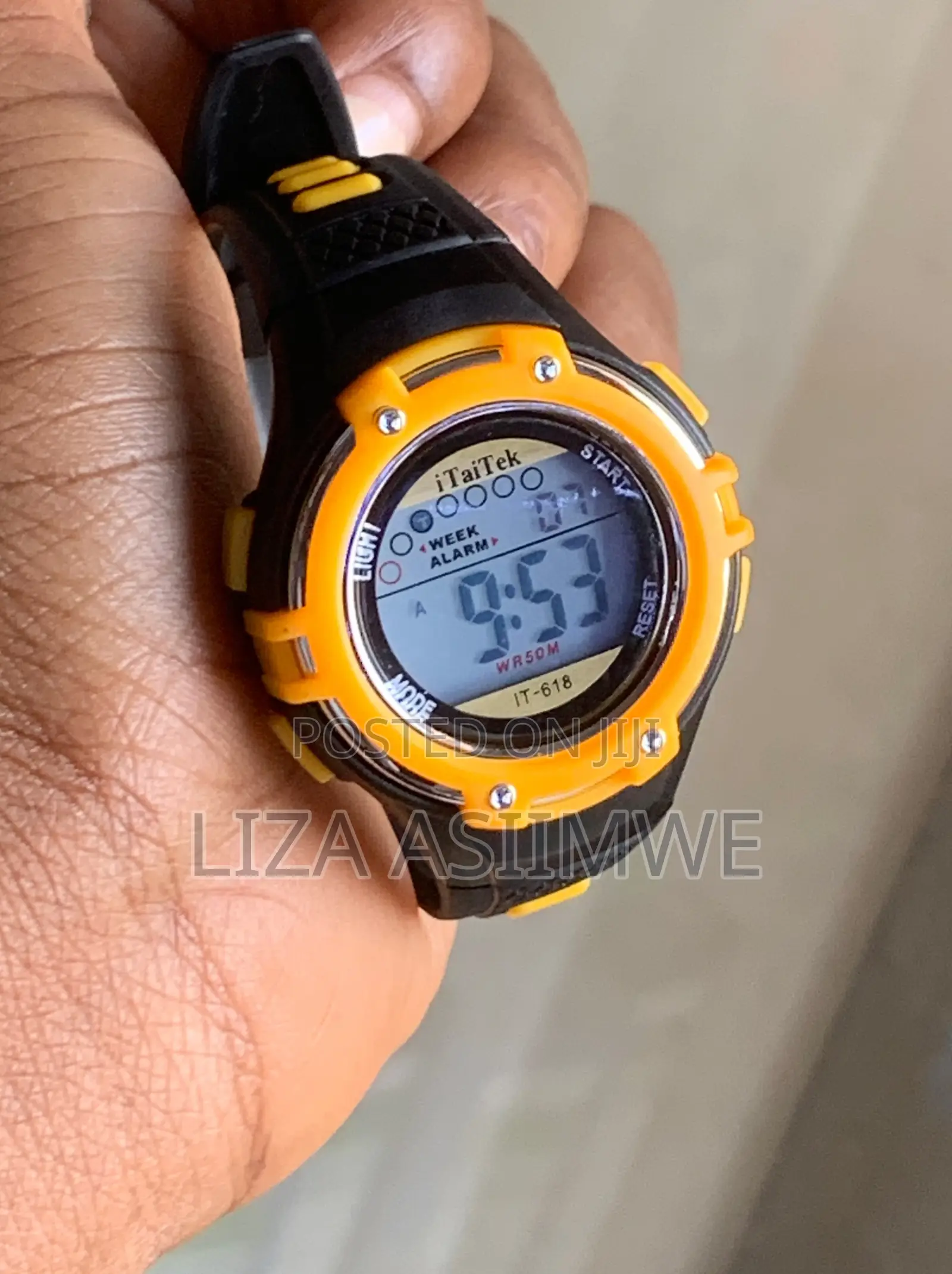 Digital Sports Watch for Kids Shown Inside Aclear Plastic Display Case