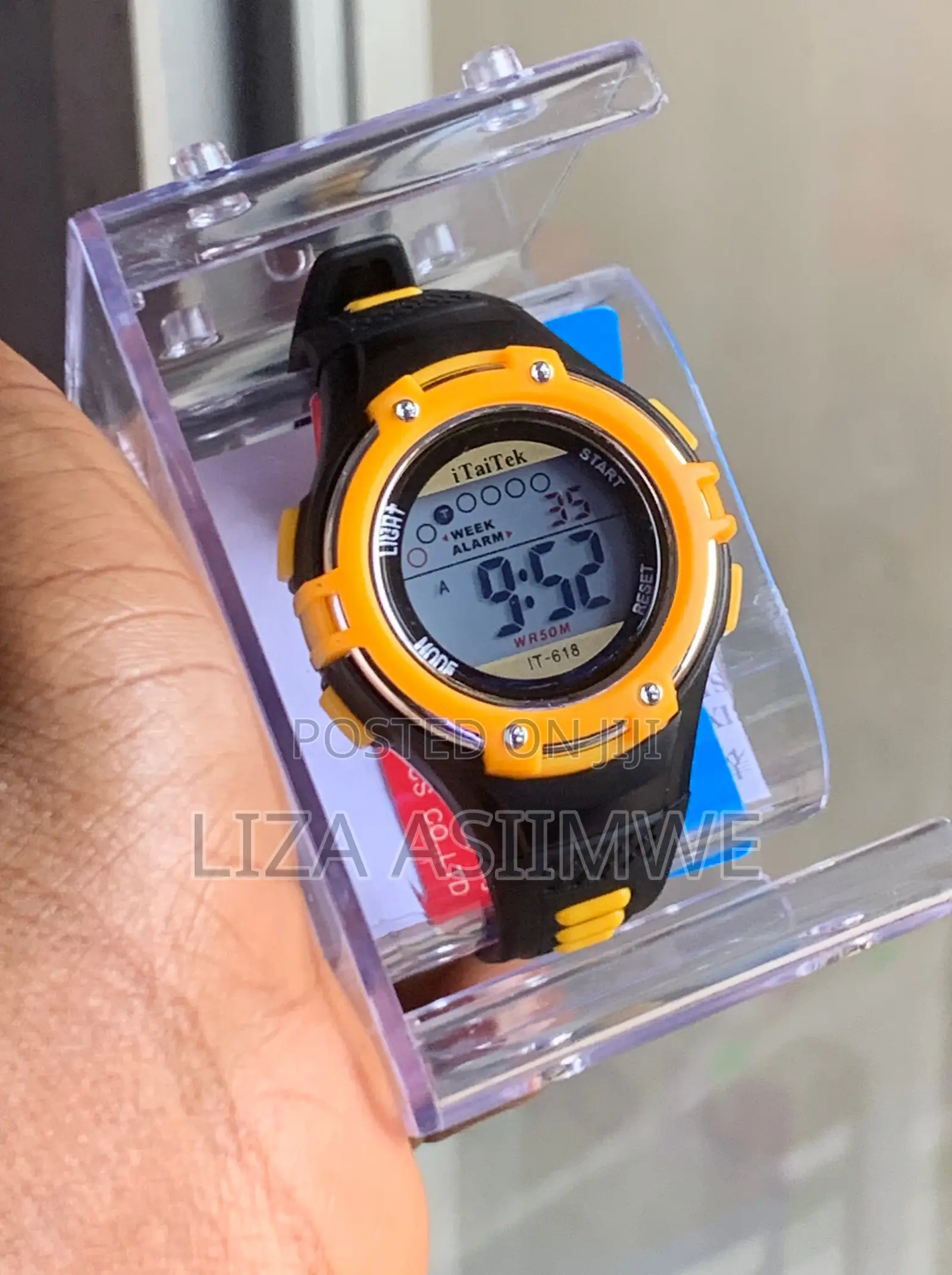Digital Sports Watch for Kids Shown Inside Aclear Plastic Display Case