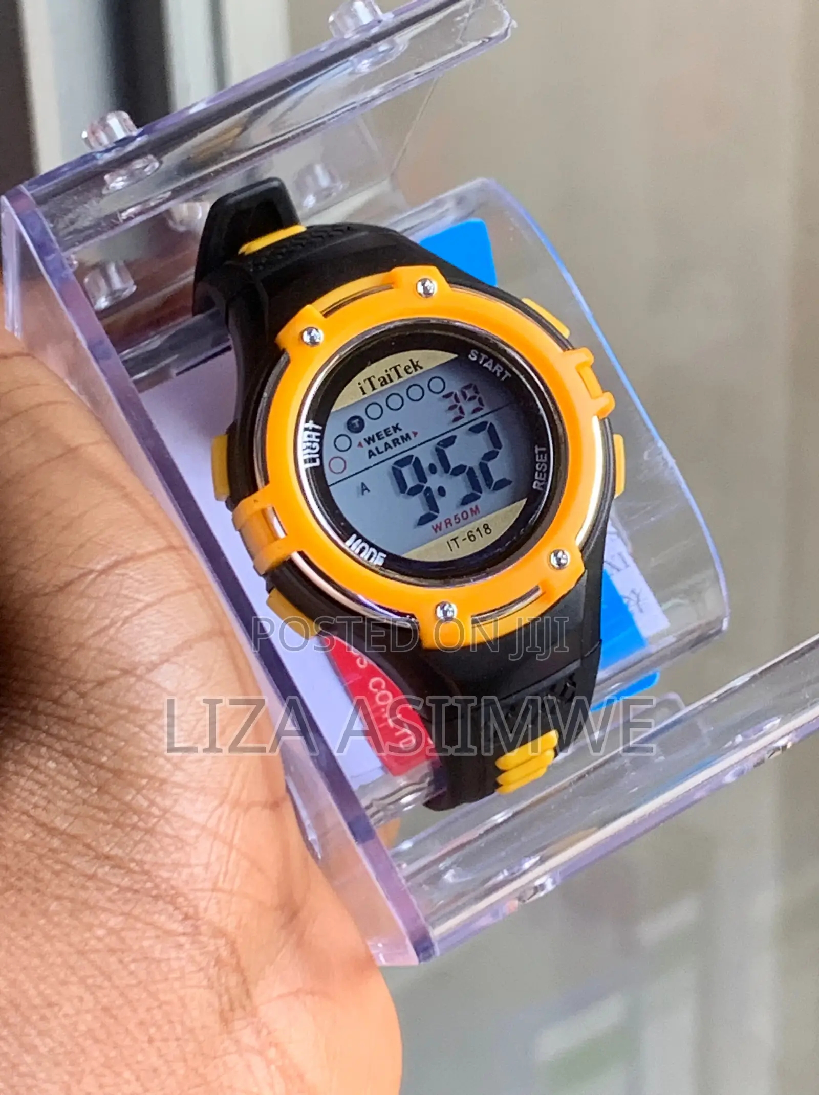Digital Sports Watch for Kids Shown Inside Aclear Plastic Display Case