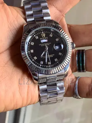Silver Metal Rolex Watch With a Black Dial With Crystal Hour Markers