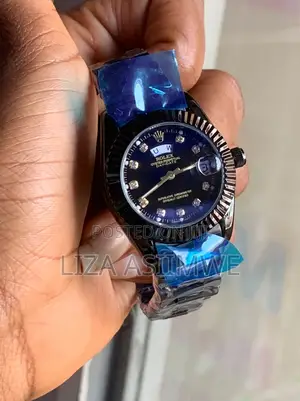 Black Rolex Oyster Perpetual Day-Date Style Watch With a Fluted Bezel
