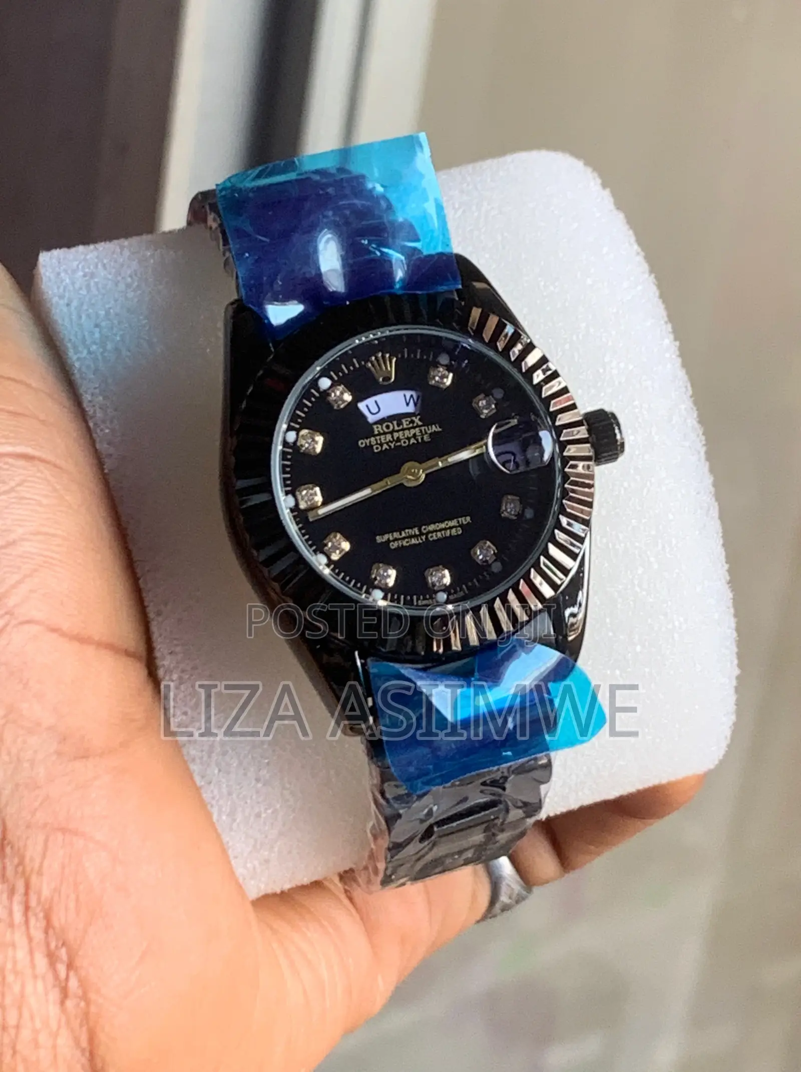 Black Rolex Oyster Perpetual Day-Date Style Watch With a Fluted Bezel