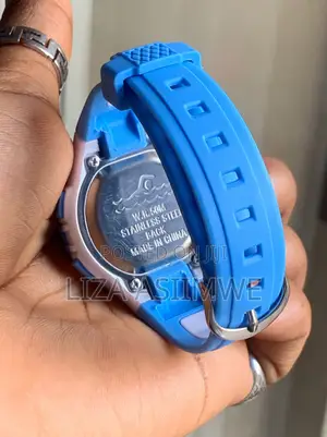 Children's Digital Sports Watch With a Blue and White Plastic Strap
