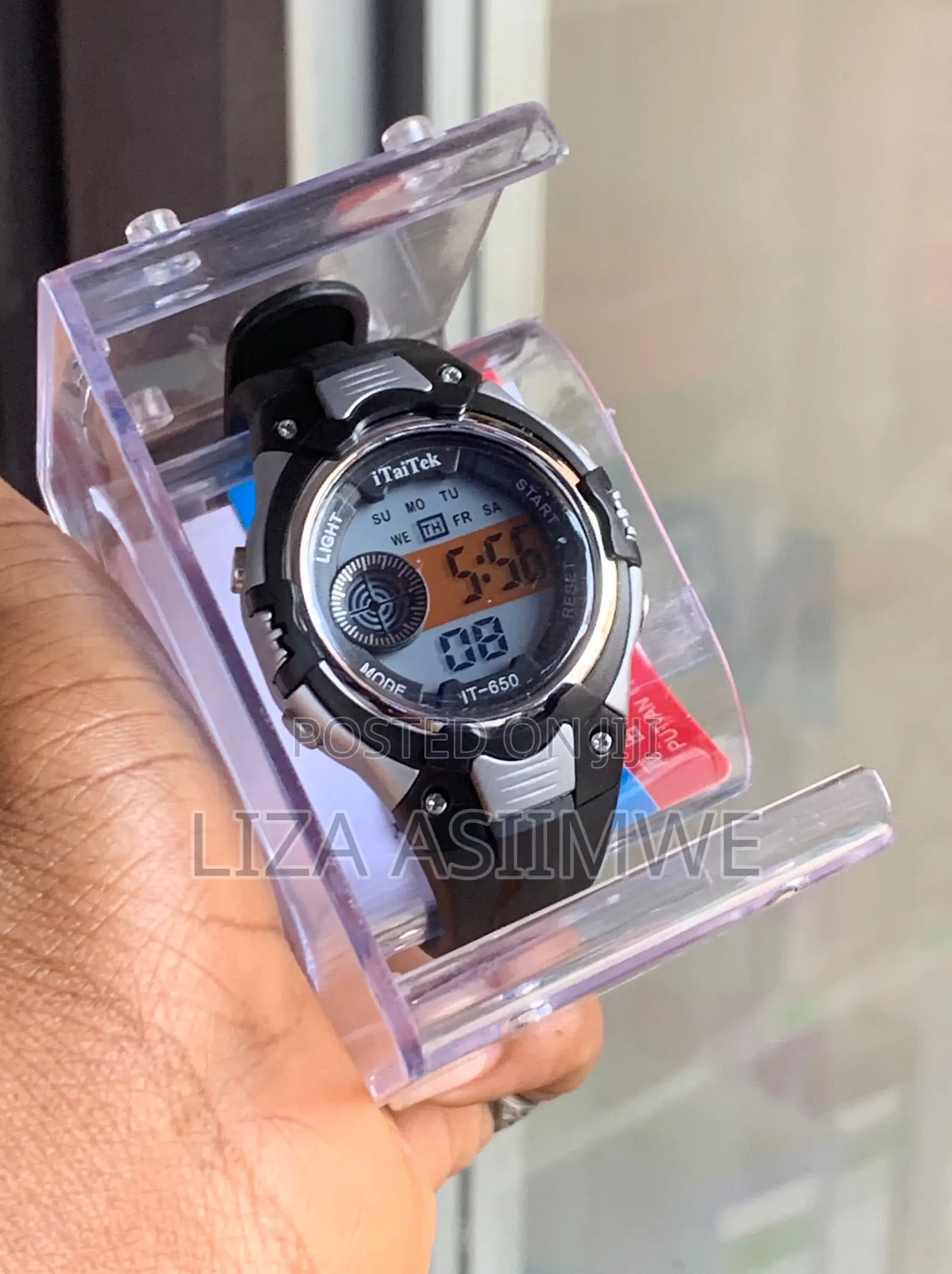Kids Digital Sports Watch Featuring a Black and Silver Plastic Case